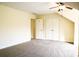 Bright, spacious room features plush carpet, two closets, and a ceiling fan at 1215 39Th Ne Ave, Hickory, NC 28601