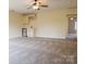 Bonus room with wet bar, carpet, and neutral walls at 1215 39Th Ne Ave, Hickory, NC 28601