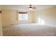 Bonus room featuring neutral walls, carpet, and a window at 1215 39Th Ne Ave, Hickory, NC 28601