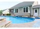 Backyard view of the in-ground pool with an attached hot tub at 1215 39Th Ne Ave, Hickory, NC 28601