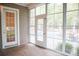 Bright sunroom with views of the swimming pool and backyard at 1215 39Th Ne Ave, Hickory, NC 28601
