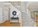 Elegant foyer with a staircase, hardwood floors, and decorative accents at 1305 Foxfield Rd # 60, Waxhaw, NC 28173