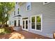 Charming two-story home with a wood deck and outdoor lighting at 1305 Foxfield Rd # 60, Waxhaw, NC 28173
