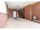 A spacious carport featuring brick walls and a concrete floor, perfect for parking and storage at 1307 Armstrong Rd, Belmont, NC 28012