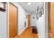 Hallway with multiple rooms and beautiful hardwood floors at 1307 Armstrong Rd, Belmont, NC 28012
