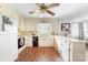 Bright and airy kitchen with white cabinets, and laminate countertops at 1307 Armstrong Rd, Belmont, NC 28012