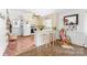 Bright kitchen with breakfast bar and white appliances at 1307 Armstrong Rd, Belmont, NC 28012