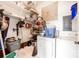A functional laundry room/storage area with shelving and modern washer and dryer at 1307 Armstrong Rd, Belmont, NC 28012
