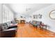 Bright living room with hardwood floors and a cozy fireplace at 1307 Armstrong Rd, Belmont, NC 28012
