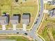 High angle view of modern neighborhood, with well-manicured lawns and ample parking spaces at 13547 Roderick Dr, Huntersville, NC 28078