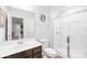 Bathroom with white vanity, walk-in shower with glass doors, and standard toilet at 13547 Roderick Dr, Huntersville, NC 28078