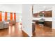 Modern kitchen with dark wood cabinets, stainless steel appliances, and an open layout at 13547 Roderick Dr, Huntersville, NC 28078