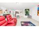 Finished basement entertainment area, equipped with plush seating and decor for the perfect viewing experience at 13547 Roderick Dr, Huntersville, NC 28078