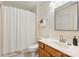 Cozy bathroom with a shower curtain, vanity with mirror, and neutral paint at 1405 Ridge Haven Rd, Waxhaw, NC 28173