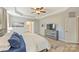 Cozy bedroom featuring hardwood floors, neutral tones, and an ensuite bathroom at 1405 Ridge Haven Rd, Waxhaw, NC 28173