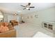 Spacious bonus room with neutral walls and carpet, and multiple ceiling fans at 1405 Ridge Haven Rd, Waxhaw, NC 28173