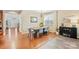 Bright dining room with modern light fixture and lots of natural light at 1405 Ridge Haven Rd, Waxhaw, NC 28173