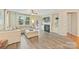 Comfortable living room featuring a fireplace, built-in shelving, and large windows at 1405 Ridge Haven Rd, Waxhaw, NC 28173