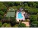 Bird's-eye view of the community pool, tennis courts, and sand volleyball court at 15744 Berryfield St, Huntersville, NC 28078