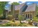 The backyard features an outdoor seating area and manicured landscaping at 15744 Berryfield St, Huntersville, NC 28078