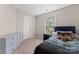This carpeted bedroom featuring a twin bed and dresser provides versatile space for relaxation and personalization at 15744 Berryfield St, Huntersville, NC 28078