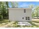 Home featuring a simple backyard and exterior with a patio at 1811 Wildwood Dr, Charlotte, NC 28214