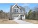 Two-story home with gray siding, garage, well-kept lawn, and inviting entrance at 2129 Tom Sadler Rd # 7160, Charlotte, NC 28214