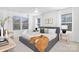Well-lit main bedroom with multiple windows, neutral colors, and a comfortable, inviting space at 2129 Tom Sadler Rd # 7160, Charlotte, NC 28214