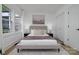 Relaxing bedroom with a queen bed, bedside tables, and soothing wall art at 2138 Revolution Park Dr, Charlotte, NC 28208