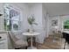 Cozy dining area with a marble top table and an abundant natural light at 2138 Revolution Park Dr, Charlotte, NC 28208