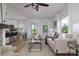 Comfortable living room open to the kitchen featuring modern furnishings, natural light, and neutral accents at 2138 Revolution Park Dr, Charlotte, NC 28208