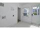 Functional mudroom with tile floor and exterior door, offering convenience and style with direct outdoor access at 2138 Revolution Park Dr, Charlotte, NC 28208