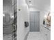 Modern bathroom with marble floors, double vanity, and walk-in shower at 2200 Hastings Dr, Charlotte, NC 28207