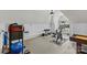 Well-equipped home gym featuring exercise bike, weights, and large exercise ball at 2200 Hastings Dr, Charlotte, NC 28207