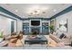 Spacious living room with custom built-ins, a fireplace, and comfortable seating arrangement, perfect for relaxation at 2200 Hastings Dr, Charlotte, NC 28207