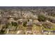 Expansive aerial view of a residential community featuring tree-lined streets and well-maintained homes at 2232 Glenraven Ave, Gastonia, NC 28052