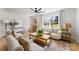Warm and inviting living room with modern decor, hardwood floors, and ample natural light, perfect for entertaining at 2232 Glenraven Ave, Gastonia, NC 28052