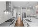 Modern kitchen with stainless steel appliances, an island, and white subway tile backsplash at 2316 Westminster Pl, Charlotte, NC 28207