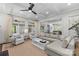 Bright living room with coffered ceilings, comfortable seating, and open access to the kitchen at 2316 Westminster Pl, Charlotte, NC 28207