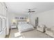 Spacious main bedroom featuring a seating area, large windows, and en-suite bathroom access at 2316 Westminster Pl, Charlotte, NC 28207