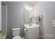 Bathroom featuring neutral paint, tile flooring, and a toilet at 2388 Loch Stone Dr # E, Gastonia, NC 28054