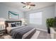 Virtually staged bedroom featuring a queen sized bed and neutral paint at 2388 Loch Stone Dr # E, Gastonia, NC 28054
