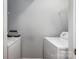 Laundry room featuring a white washer and dryer at 2388 Loch Stone Dr # E, Gastonia, NC 28054