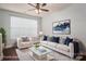 Inviting living room with modern decor, plush seating, and ample natural light at 2388 Loch Stone Dr # E, Gastonia, NC 28054