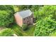 Aerial view of a brick home showing mature trees and manicured lawn at 2417 Hamilton Mill Rd, Charlotte, NC 28270