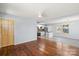 Open-concept living space featuring hardwood floors, a modern kitchen, and natural light at 2515 Danforth Ln, Charlotte, NC 28208