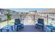 Relaxing balcony area with stylish seating, offering a cozy outdoor retreat with neighborhood views at 2551 Statesville Ave, Charlotte, NC 28206