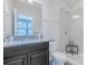 Modern bathroom with granite vanity, glass-enclosed shower, and contemporary fixtures at 2551 Statesville Ave, Charlotte, NC 28206