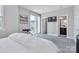 Spacious bedroom featuring sliding glass doors to a balcony, allowing for ample natural light at 2551 Statesville Ave, Charlotte, NC 28206