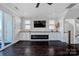 Cozy living room with an electric fireplace and built-in storage for organized living at 2551 Statesville Ave, Charlotte, NC 28206